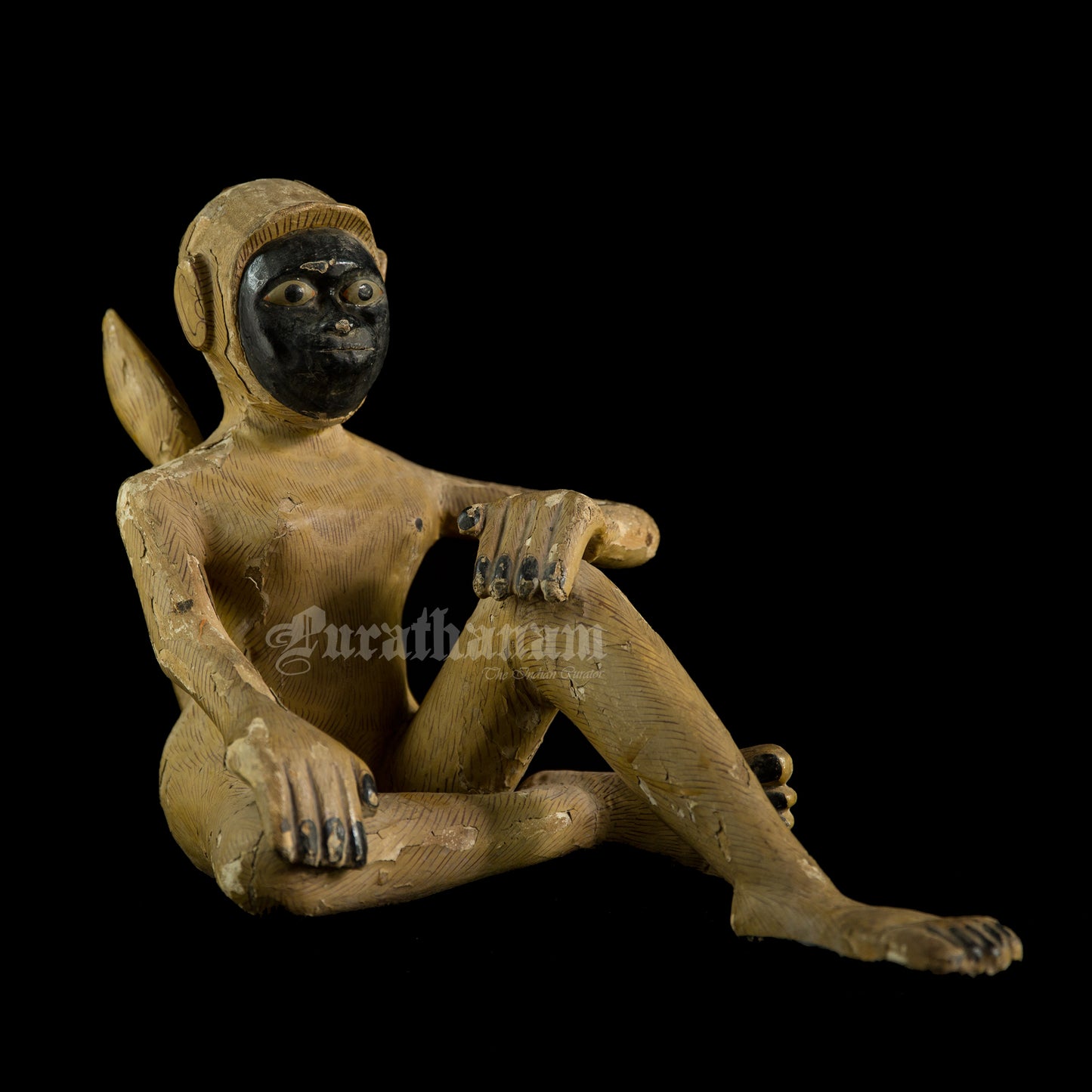 Seated female White Monkey