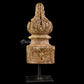 Decorative wooden bracket on stand