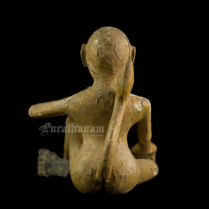 Seated female White Monkey